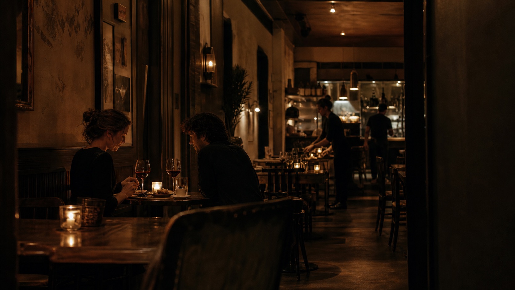 The final occupied table lingering over dessert and wine while staff quietly reset the dining room